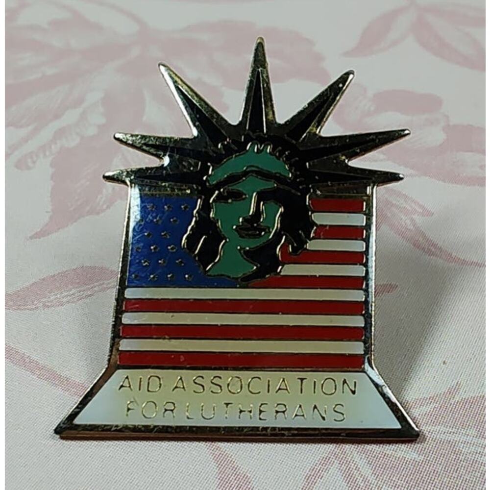Aid Association for Lutherans 1983 Signed Statue of Liberty American Flag Pin